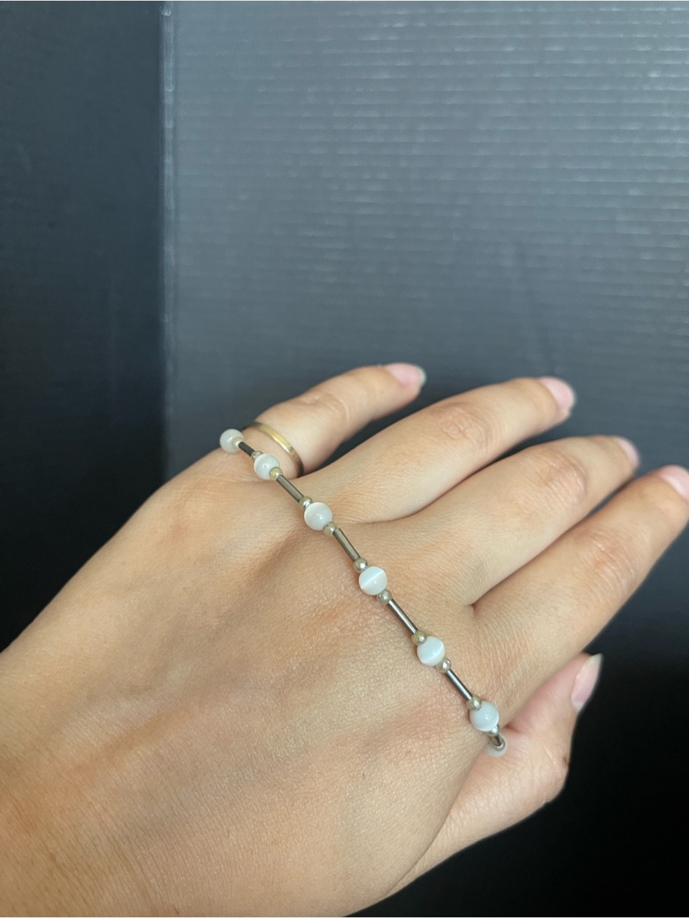 Silver tone bar and bead cat eye stone bracelet